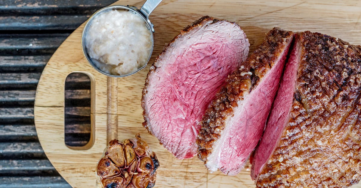 Why should I use garlic making roasted potatoes? - Sliced Roasted Meat on Brown Wooden Chopping Board Why should I use garlic making roasted potatoes? - Sliced Roasted Meat on Brown Wooden Chopping Board