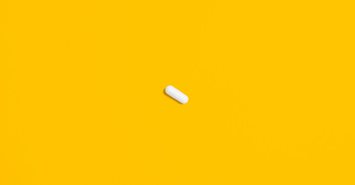 Why should one pre-heat an oven? - White Pill on Yellow Surface Why should one pre-heat an oven? - White Pill on Yellow Surface