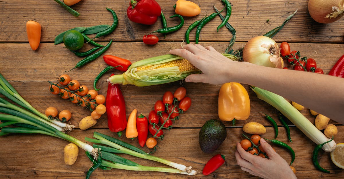 Why should we not store onions and potatoes together? - Assorted Vegetables on a Wooden Tabletop Why should we not store onions and potatoes together? - Assorted Vegetables on a Wooden Tabletop