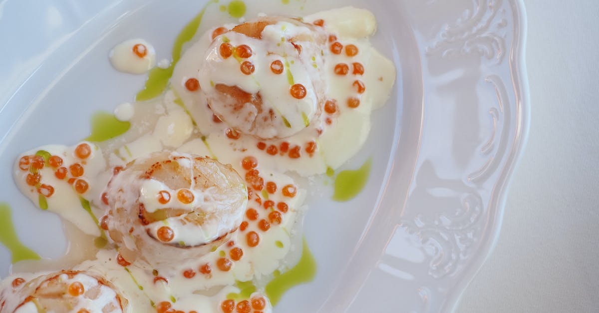 Why use an acid when doing a scallops dish? - Creamy Dish on White Ceramic Tray