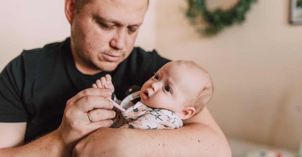 Why using low temperature cooking for potatoes? - Man Using Thermometer to Check the Baby's Temperature Why using low temperature cooking for potatoes? - Man Using Thermometer to Check the Baby's Temperature