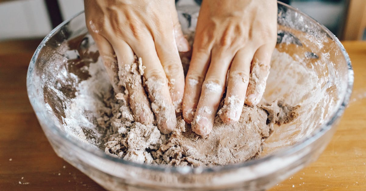 Why would a fully-developed dough lose consistency (elasticity / extensibility)? - Person Holding Brown Wooden Round Tray Why would a fully-developed dough lose consistency (elasticity / extensibility)? - Person Holding Brown Wooden Round Tray