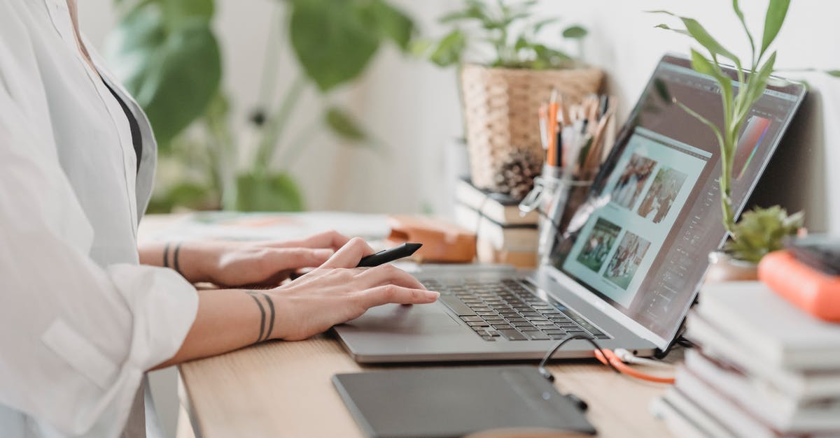 Why would a portable barbecue warn against using pots on the grill? - Woman working retouching photo on laptop at convenient workplace Why would a portable barbecue warn against using pots on the grill? - Woman working retouching photo on laptop at convenient workplace