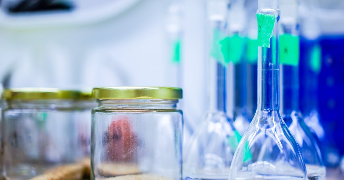 Will a dishwasher sterilize bottles for canning? - Two Clear Glass Jars Beside Several Flasks Will a dishwasher sterilize bottles for canning? - Two Clear Glass Jars Beside Several Flasks