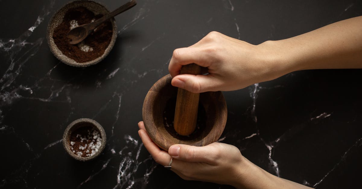 Will artificial sweeteners work in a coffee syrup recipe? - From above of crop unrecognizable female using pestle while grinding fresh aromatic coffee in mortar on black marble table Will artificial sweeteners work in a coffee syrup recipe? - From above of crop unrecognizable female using pestle while grinding fresh aromatic coffee in mortar on black marble table