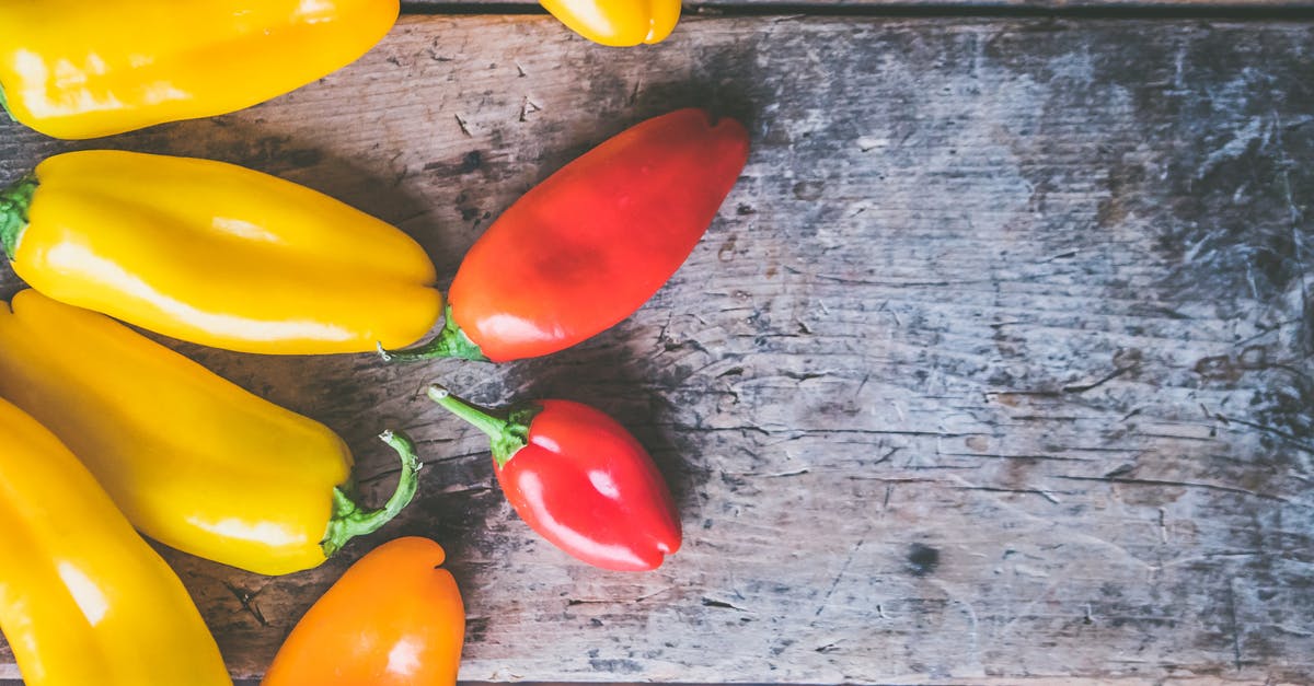 Will fresh bell peppers give stew a red colour? - Yellow, Orange, and Red Peppers on Wooden Surface Will fresh bell peppers give stew a red colour? - Yellow, Orange, and Red Peppers on Wooden Surface