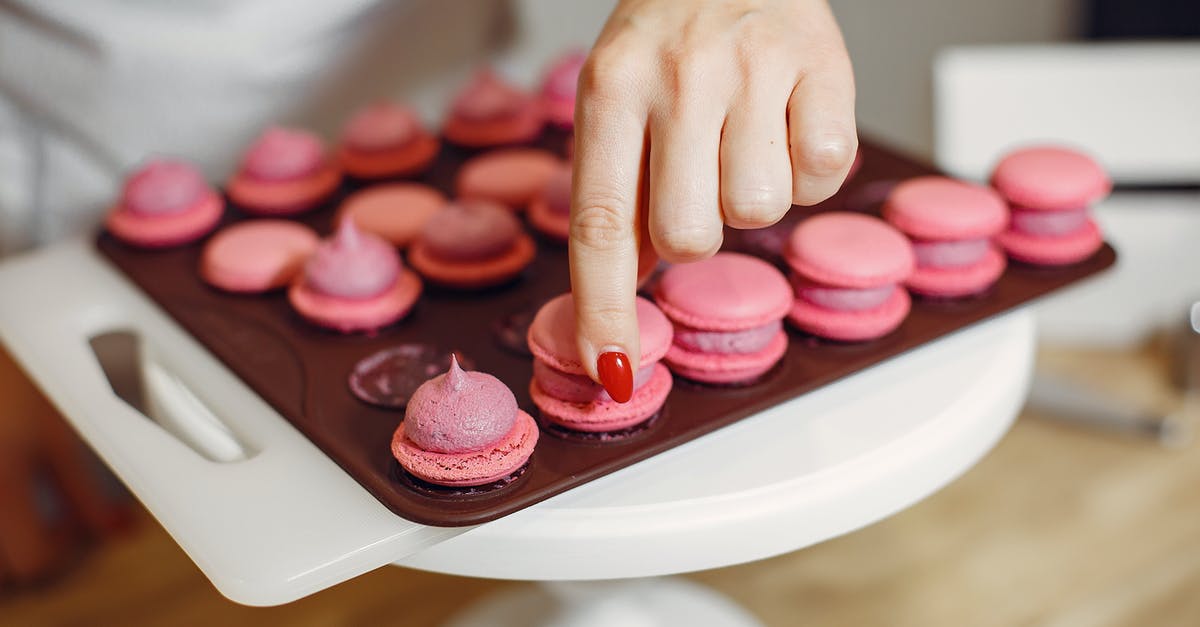 Will lowfat cream cheese keep filling from setting? - Woman placing shells of macaroons on top Will lowfat cream cheese keep filling from setting? - Woman placing shells of macaroons on top