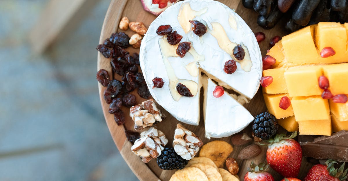 Wine substitutions for homemade salami - Sliced Banana and Strawberry on Brown Wooden Round Plate Wine substitutions for homemade salami - Sliced Banana and Strawberry on Brown Wooden Round Plate
