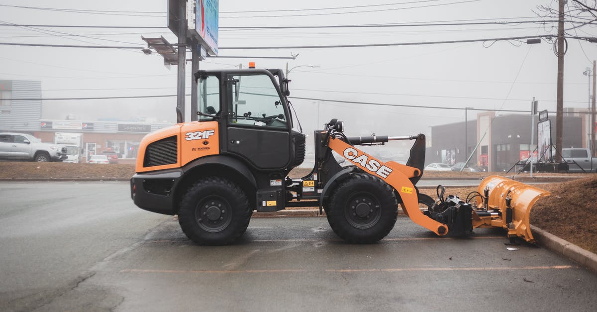 With stovetop cooking, is there a way to retain heat but let moisture escape? - Modern tractor parked on asphalt road on street With stovetop cooking, is there a way to retain heat but let moisture escape? - Modern tractor parked on asphalt road on street