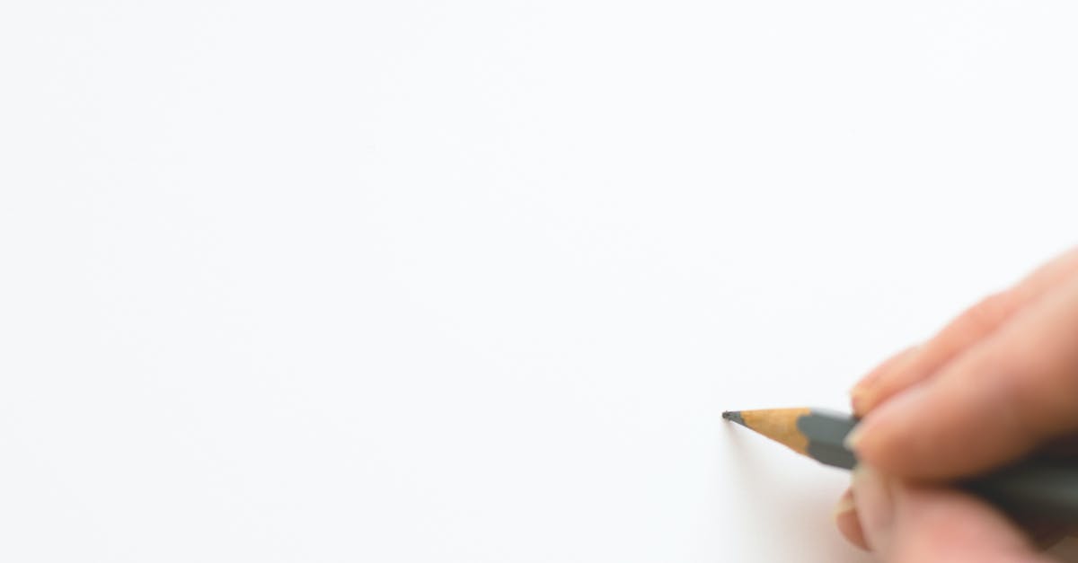 Would it be a bad idea to electroplate a knife? - Close-up of Hand Holding Pencil over White Background Would it be a bad idea to electroplate a knife? - Close-up of Hand Holding Pencil over White Background