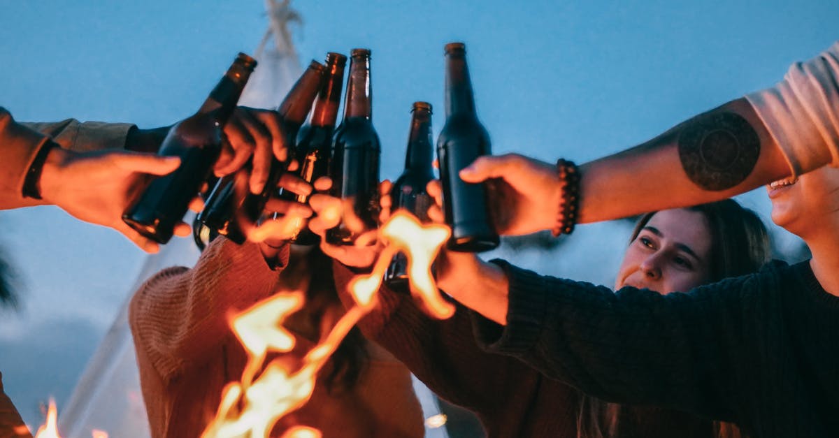 Would toasting a croissant make it catch fire - Group of Friends Clinking Beer Bottles Would toasting a croissant make it catch fire - Group of Friends Clinking Beer Bottles