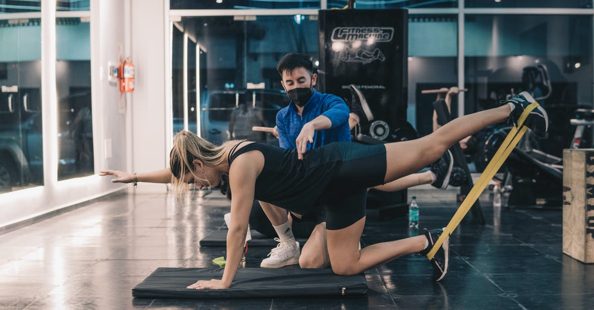 Xanthan Gum in sauce/gravy - Personal Coach Helping Woman in Performing Gym Exercise with Resistance Band Xanthan Gum in sauce/gravy - Personal Coach Helping Woman in Performing Gym Exercise with Resistance Band