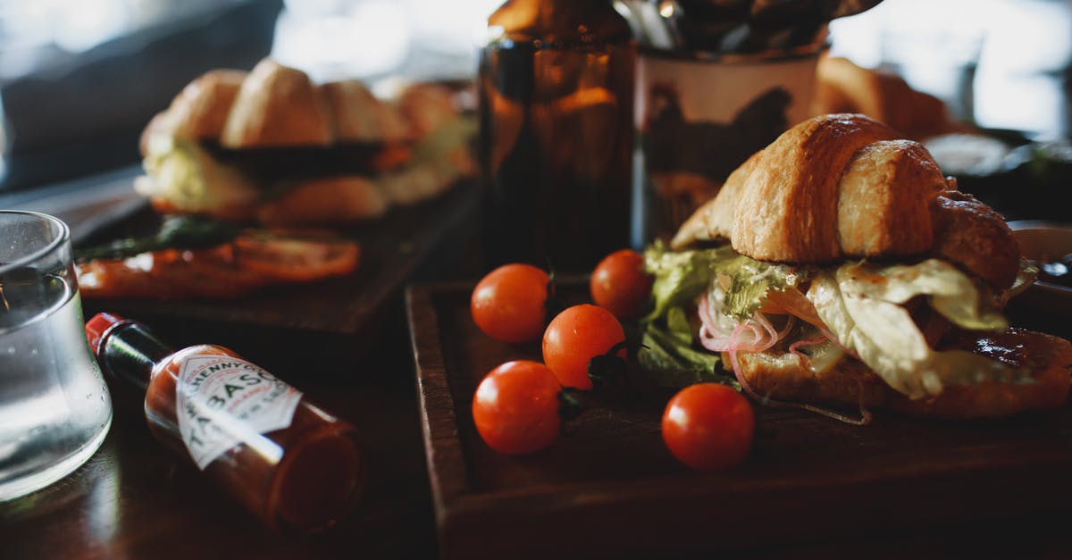 yeast subtitution in a recipe with no water - Crispy fresh croissant sandwich served with tomatoes in contemporary restaurant yeast subtitution in a recipe with no water - Crispy fresh croissant sandwich served with tomatoes in contemporary restaurant